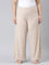 Women Solid Beige Mid Rise Ribbed Palazzos