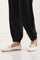 Black Solid Loose Fit Pants With Pleated Detail
