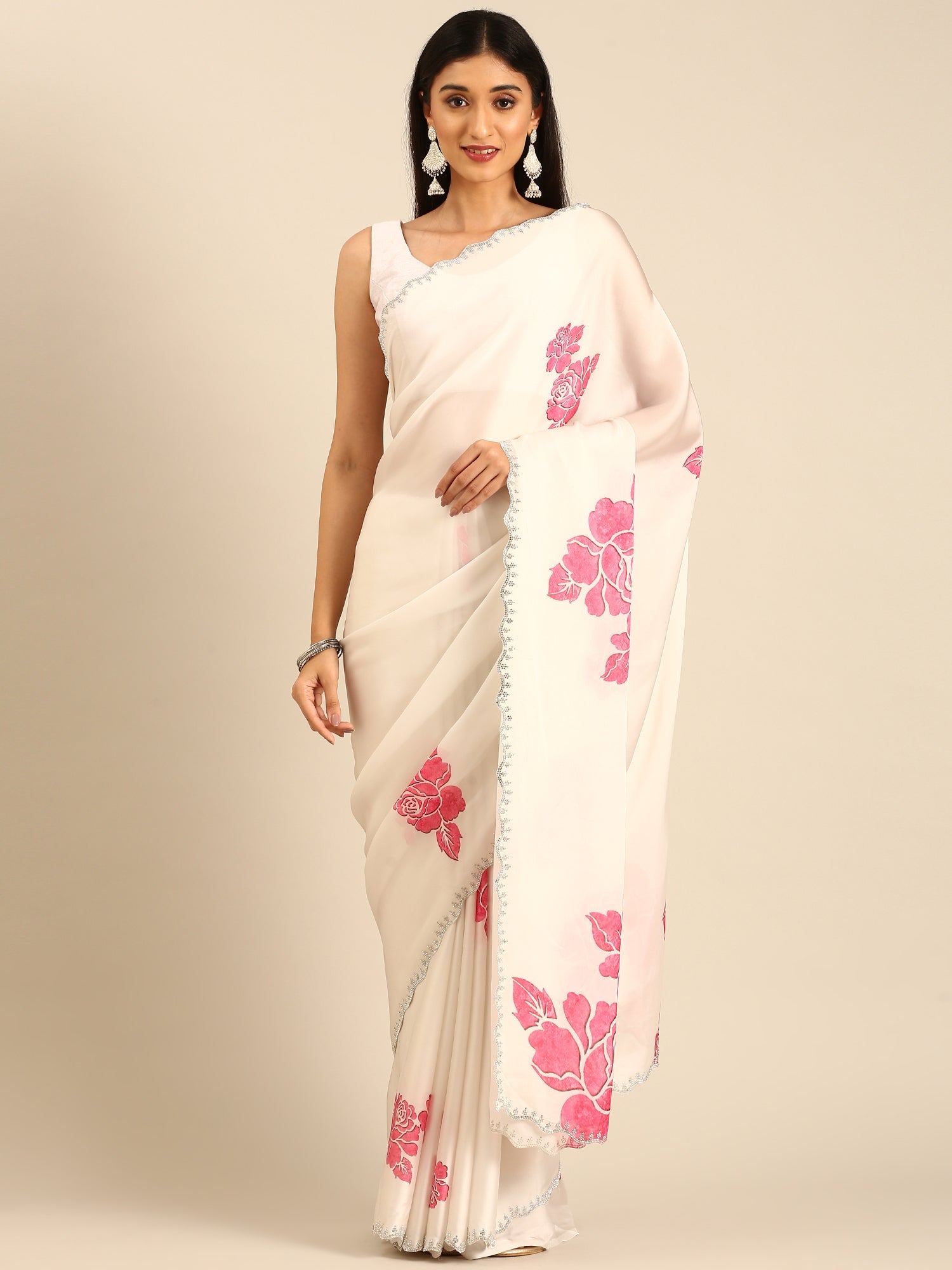 Cream satin saree with pink printed motifs with swarovski embroidery