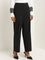 Wardrobe Black Self-Patterned Trousers