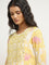 Utsa Yellow Floral Printed A-line Cotton Kurta