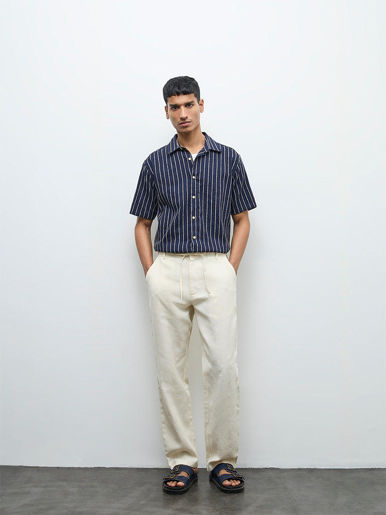 ETA Off-White Textured Relaxed-Fit Mid-Rise Cotton Chinos
