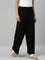 Women Solid Black Viscose Mid Rise Knit Palazzos