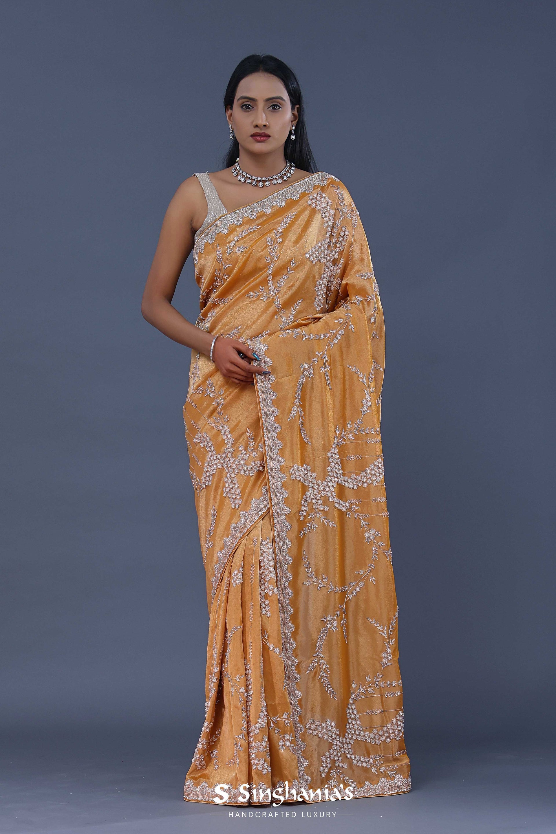 Peach Georgette Tissue Saree With Sequins Work