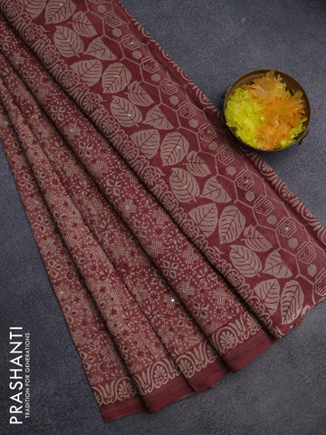 Chanderi silk cotton saree pastel maroon and beige with allover prints & mirror work and printed border