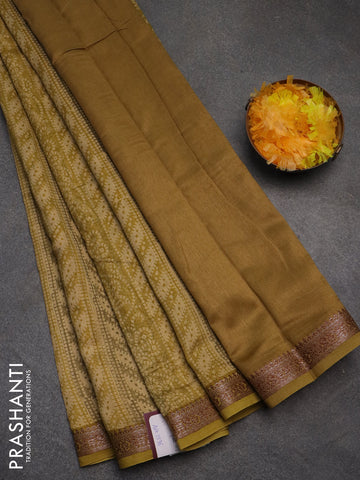 Chanderi silk cotton saree sandal mustard shade and green shade with allover prints and banarasi style border