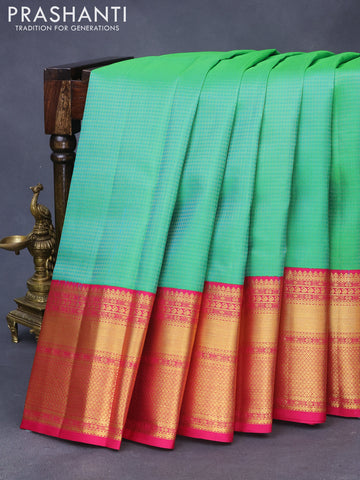 Pure kanchipuram silk saree teal green and pink with allover zari checked pattern and long zari woven korvai border