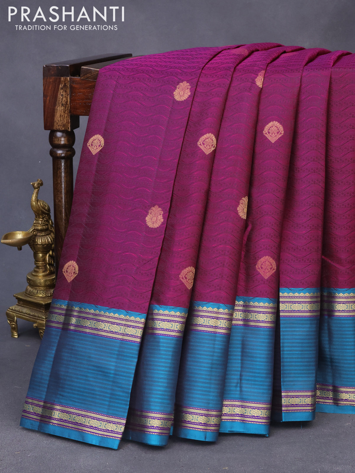 Pure kanchipuram silk saree dark magenta pink and peacock blue with allover self emboss & zari weaves and rettapet zari woven border