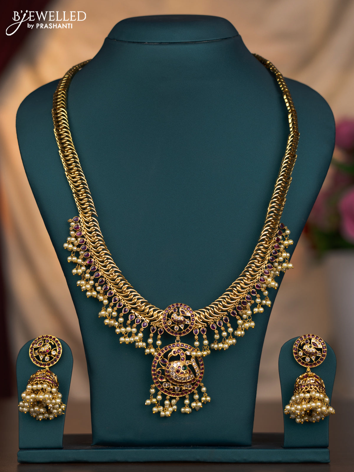 Antique haaram pecock design with kemp and cz stones and pearl hangings