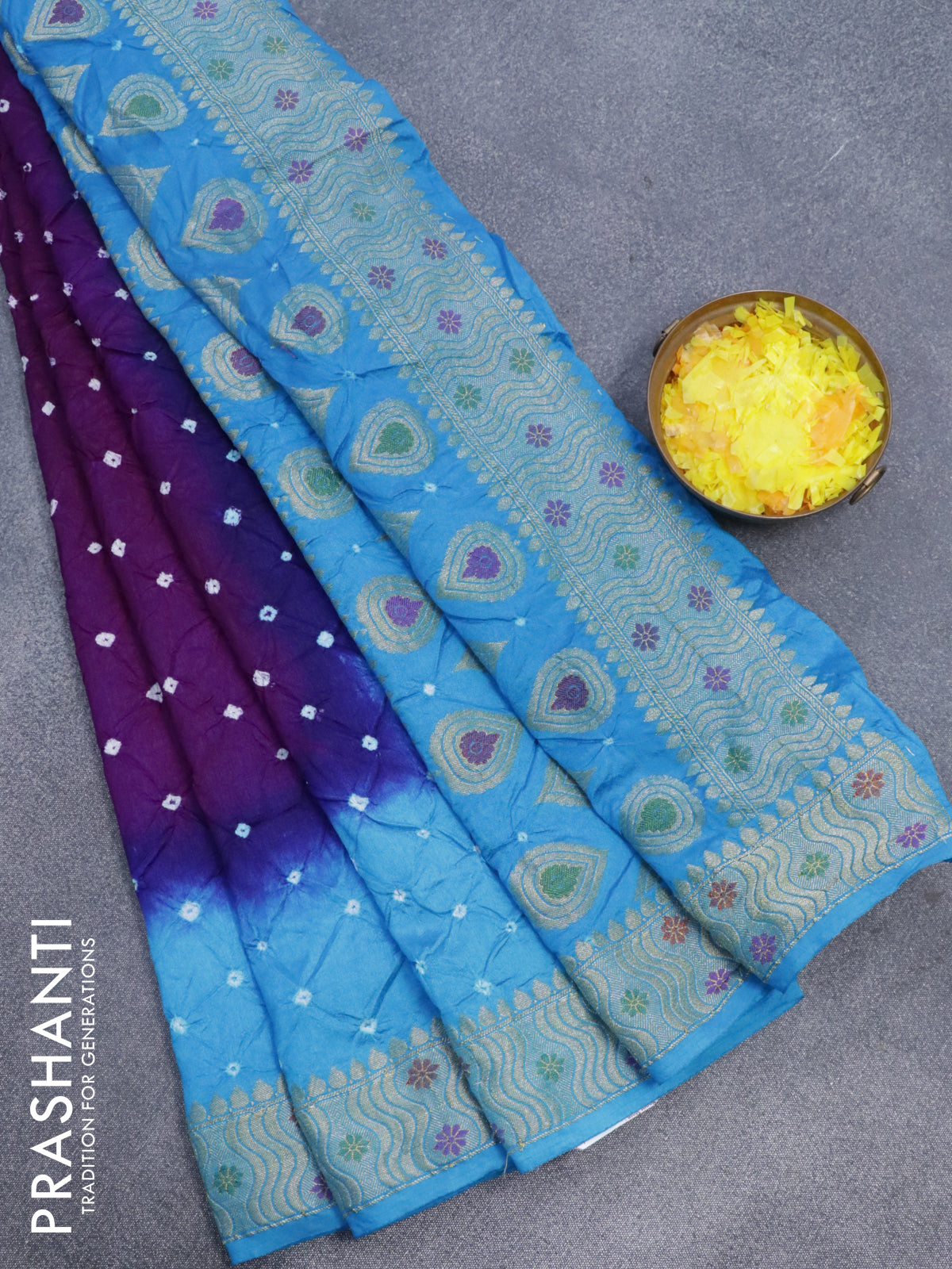 Bandhani saree deep purple and cs blue with allover bandhani prints and banarasi style border