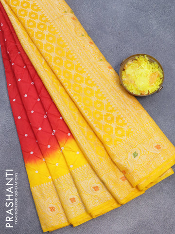 Bandhani saree red and mango yellow with allover bandhani prints and banarasi style border