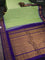 Pure gadwal silk saree pista green and blue with allover zari checks & buttas and temple design zari woven korvai border
