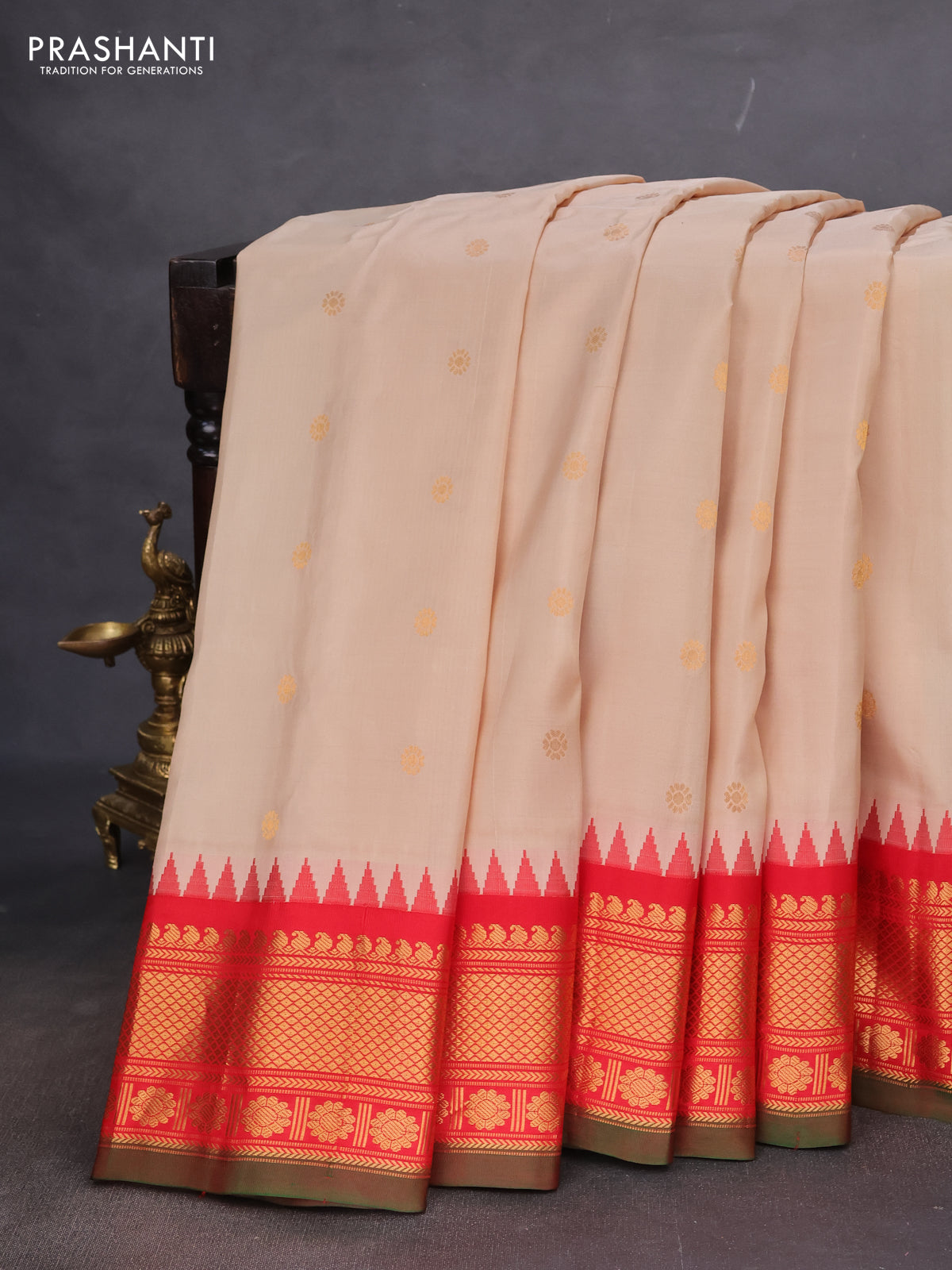 Pure gadwal silk saree cream and red with zari woven buttas and temple design zari woven border