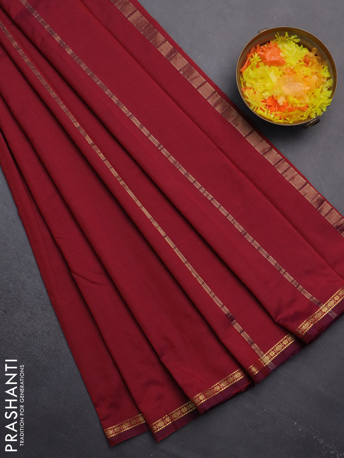 Arani semi silk saree dual shade of maroon with plain body and small zari woven border