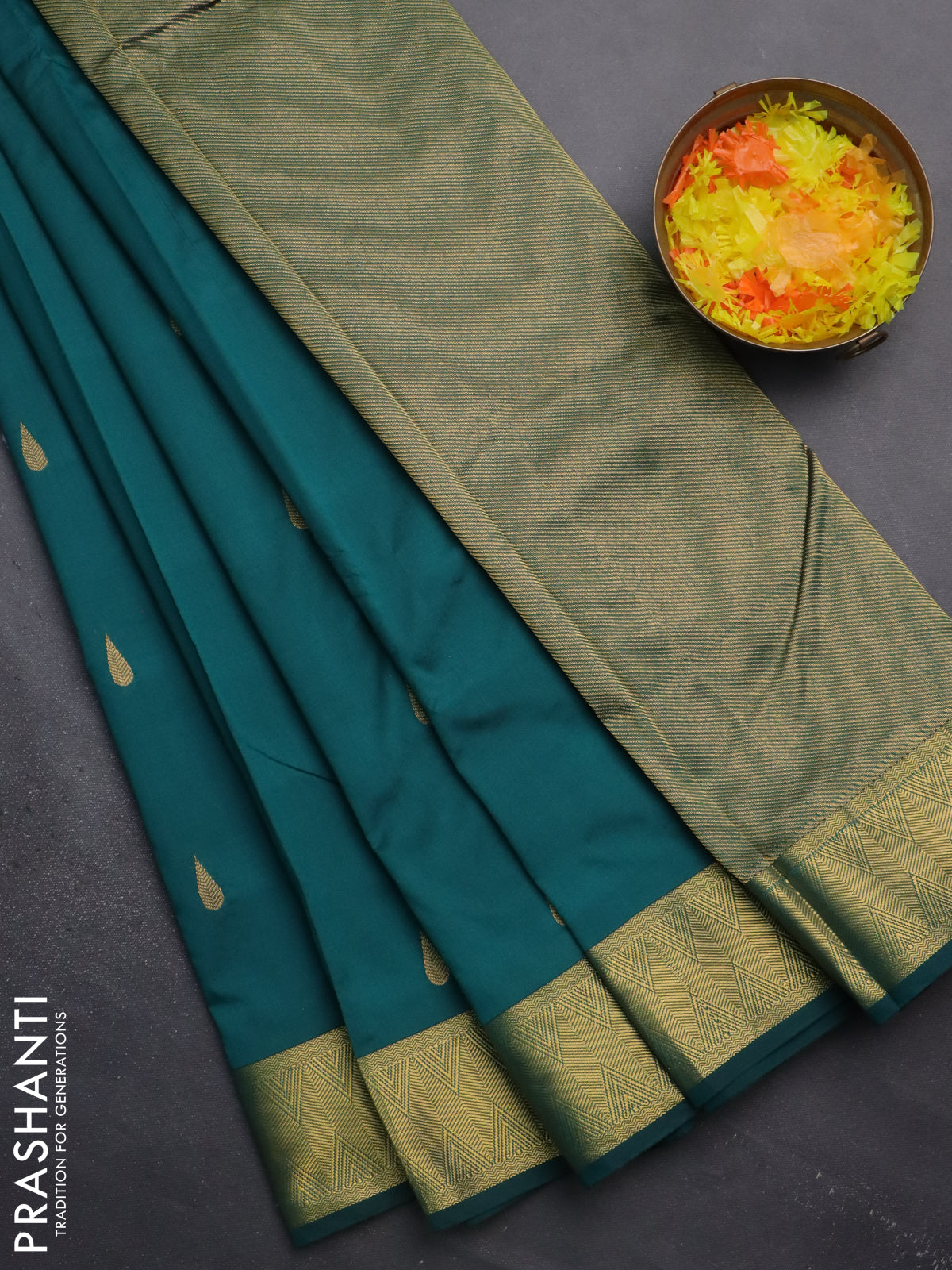 Arani semi silk saree peacock green with zari woven thilak buttas and zari woven border