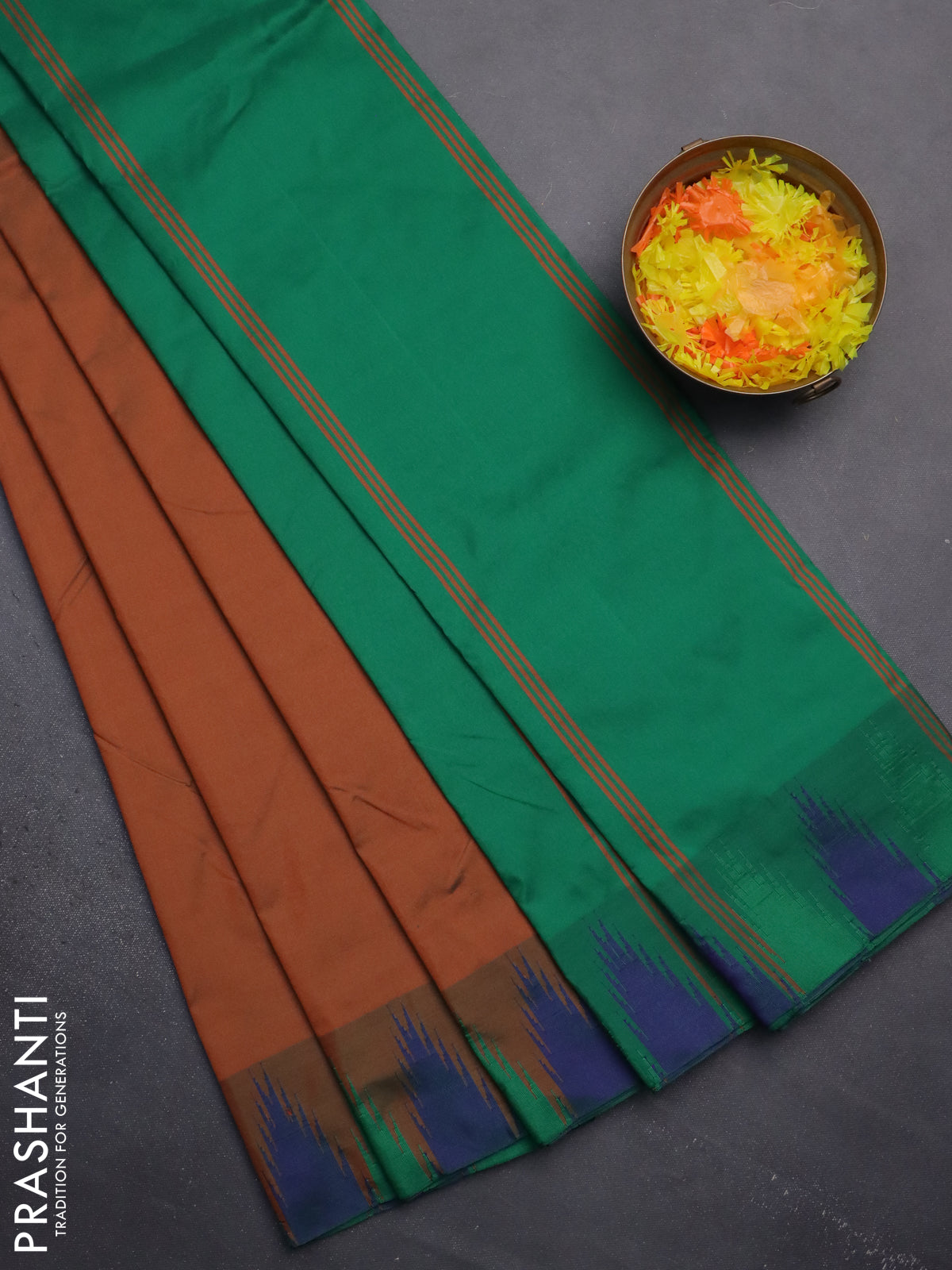 Arani semi silk saree rust shade and green with plain body and temple design border