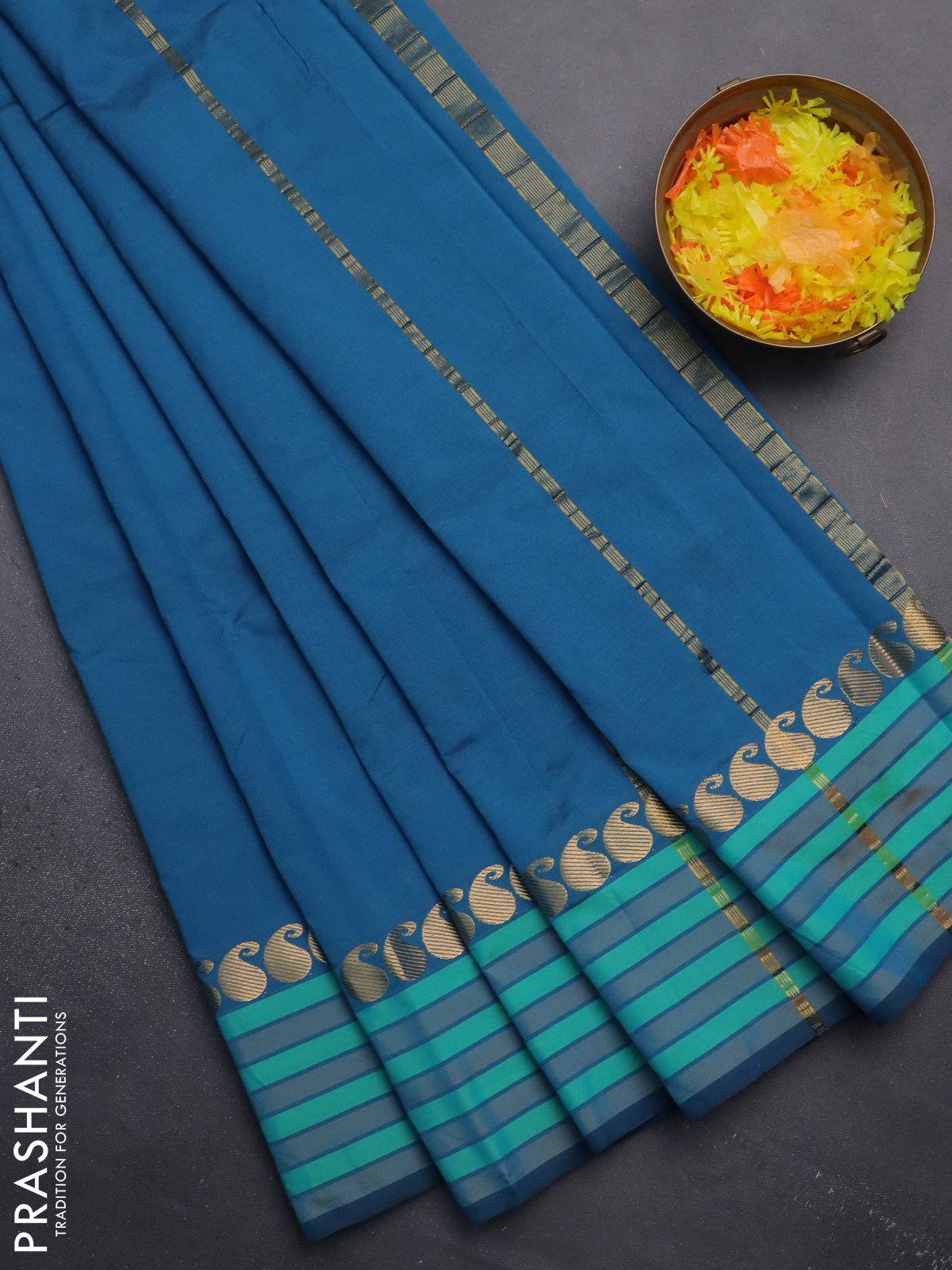 Arani semi silk saree peacock blue and teal green with plain body and paisley zari woven simple border