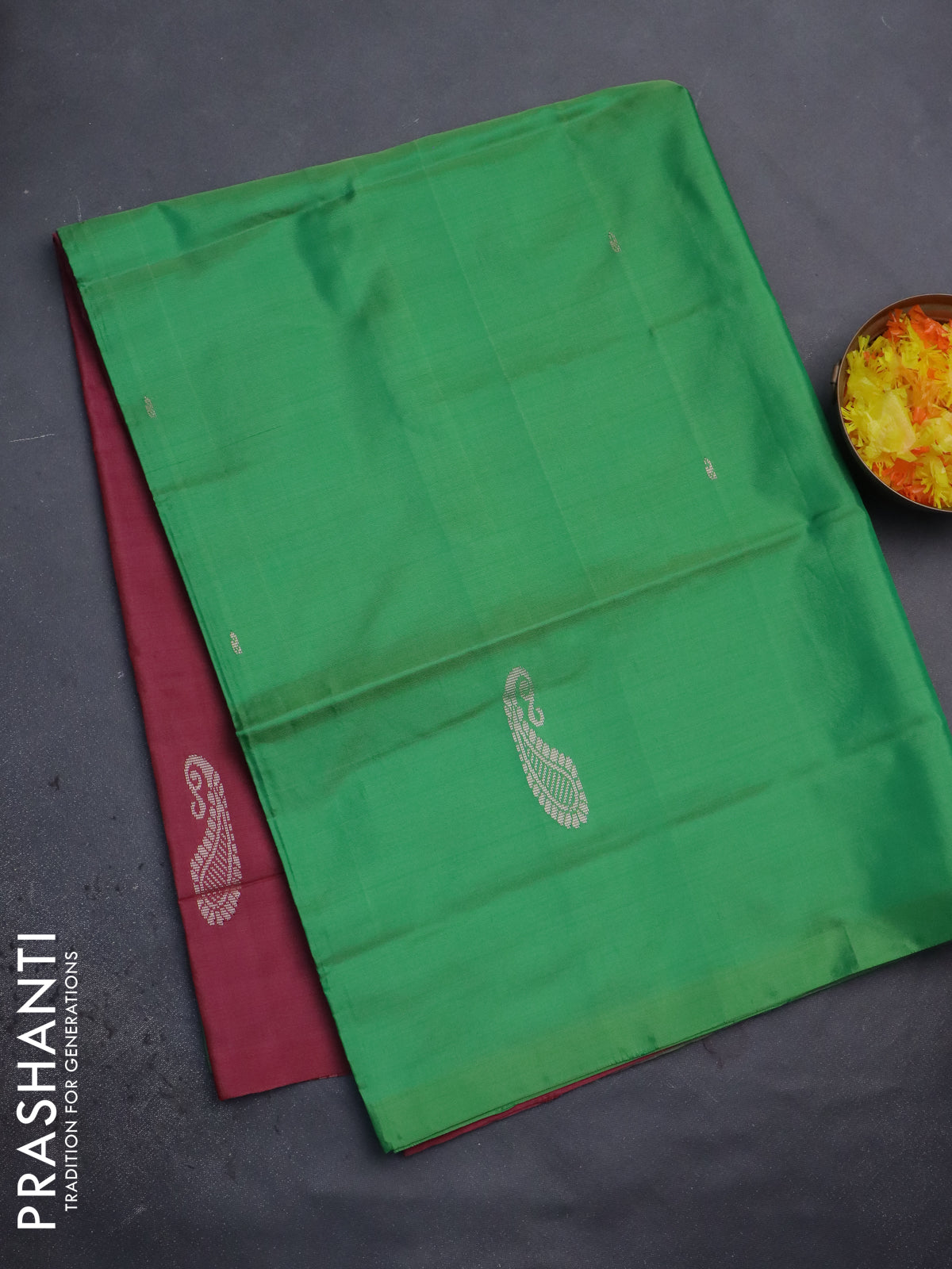 Banana pith saree green and maroon with thread woven buttas in borderless style