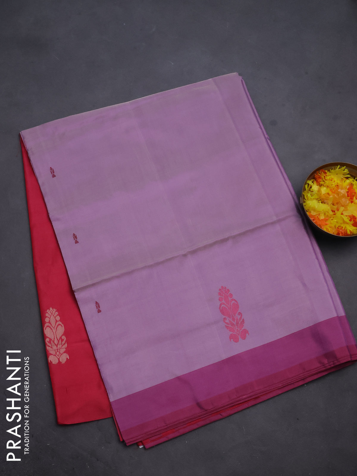 Banana pith saree mild lavender and reddish pink with thread woven buttas and contrast border