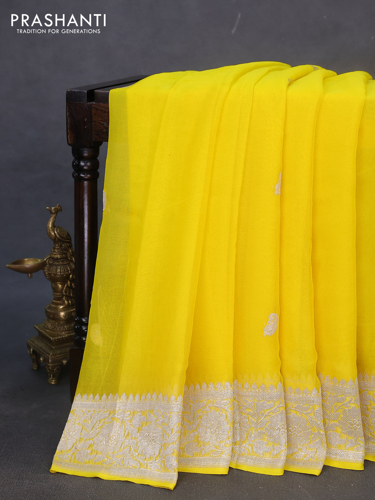 Banarasi chiffon silk saree yellow with silver zari woven buttas and silver zari woven border