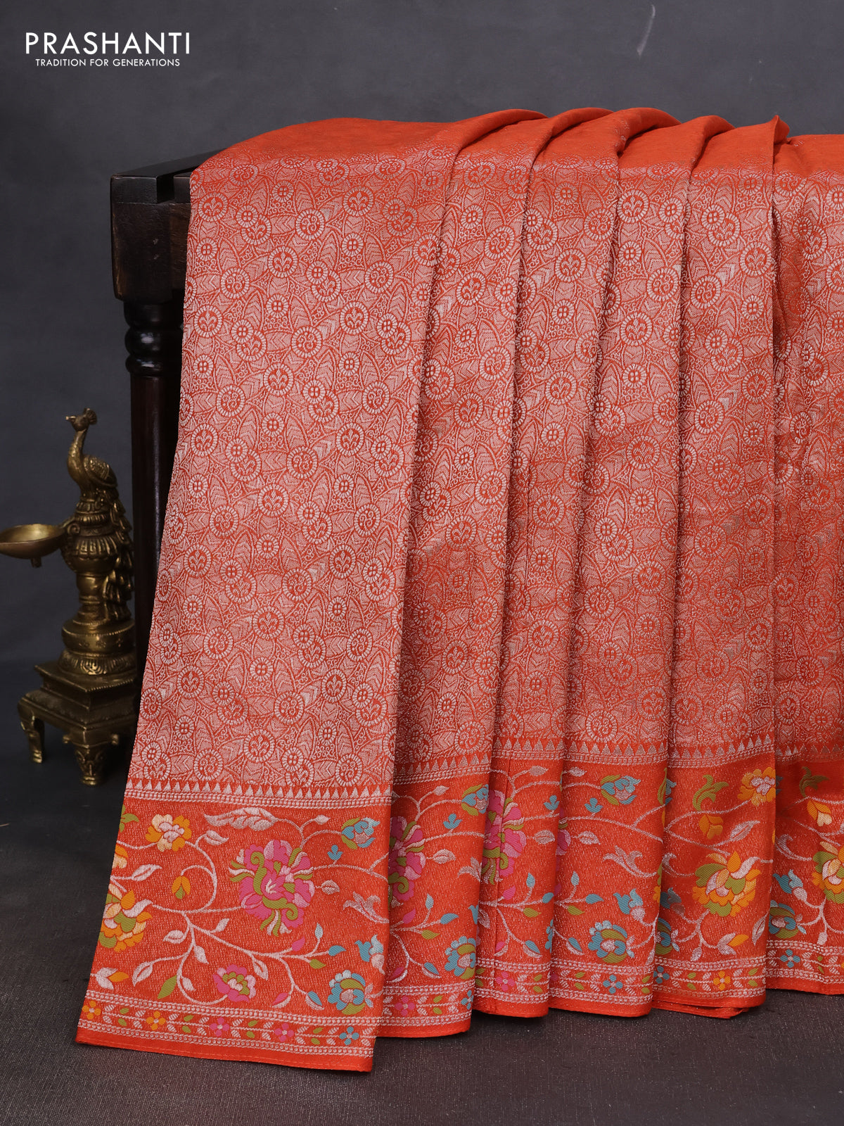 Banarasi semi raw silk saree orange with allover silver zari woven brocade weaves and floral design paithani border