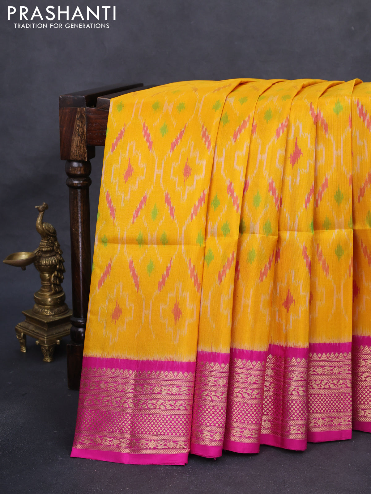 Ikat soft silk saree yellow and pink with allover ikat weaves and zari woven border