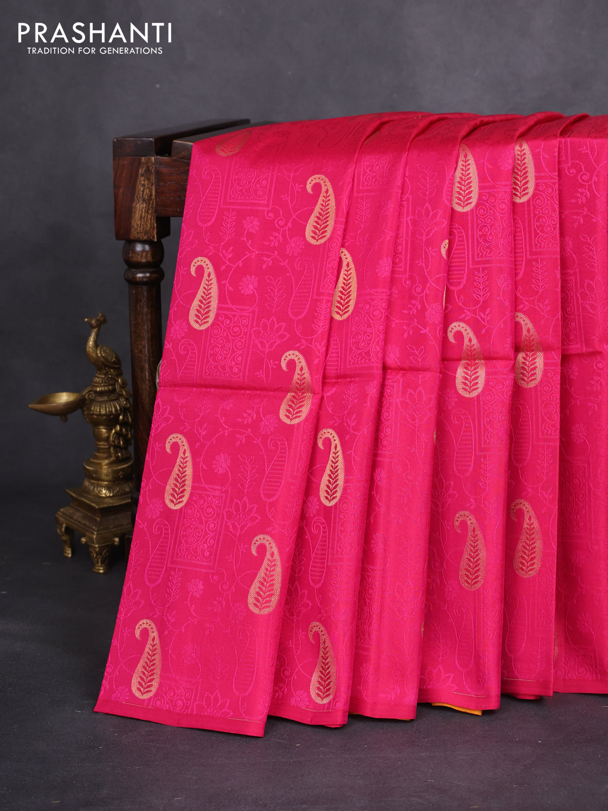 Kanchipuram soft silk saree pink and mustard yellow with allover self emboss & paisley zari buttas in borderless style