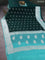 Banarasi chiffon silk saree bottle green and teal blue with silver zari woven buttas and silver zari woven border