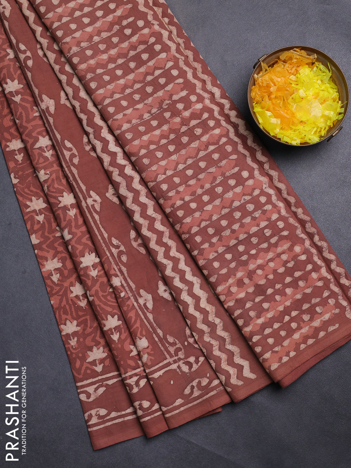 Jaipur cotton saree rust shade with allover dabu prints and printed border