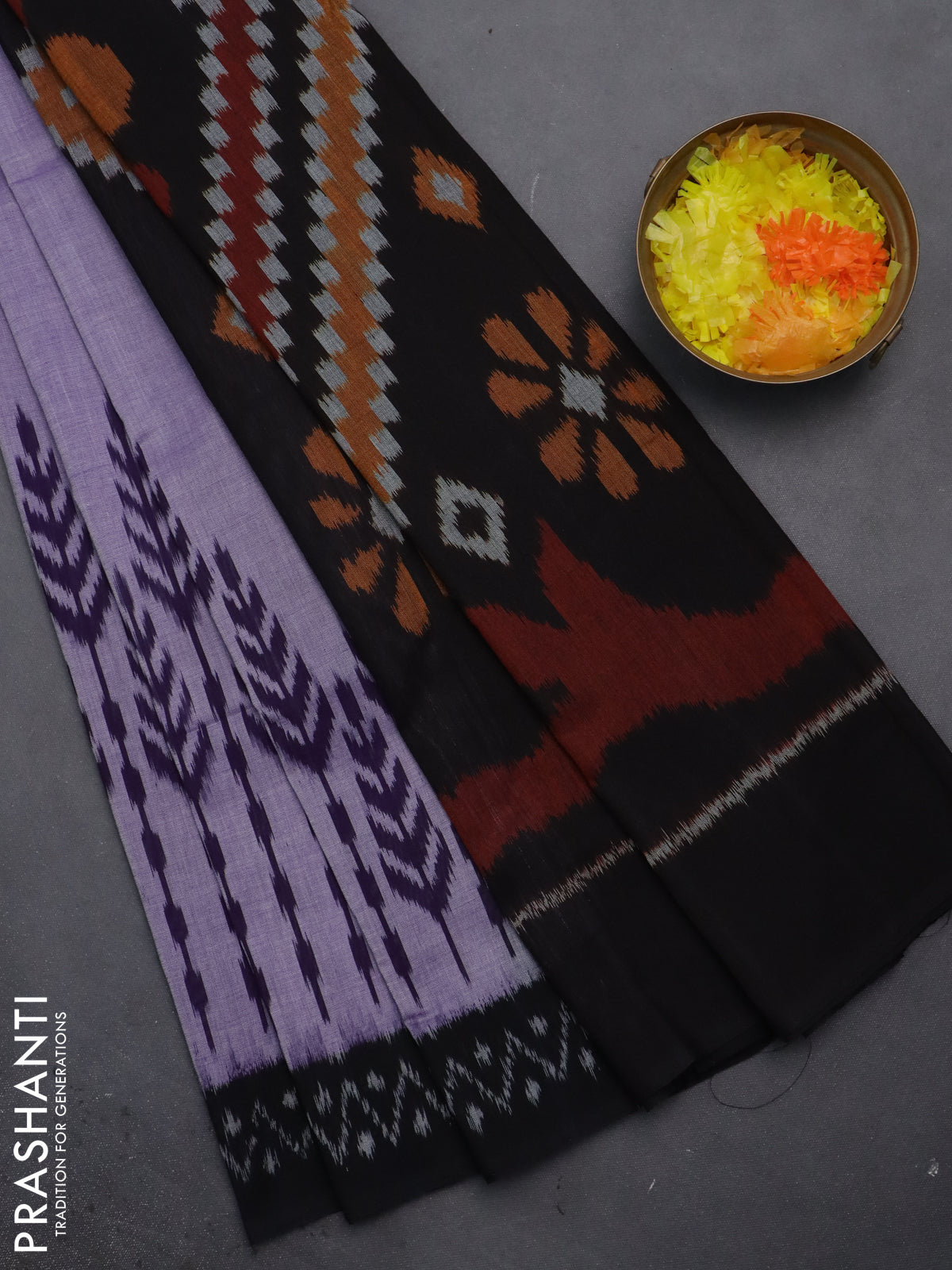Ikat cotton saree lavender and black with allover ikat weaves and simple border