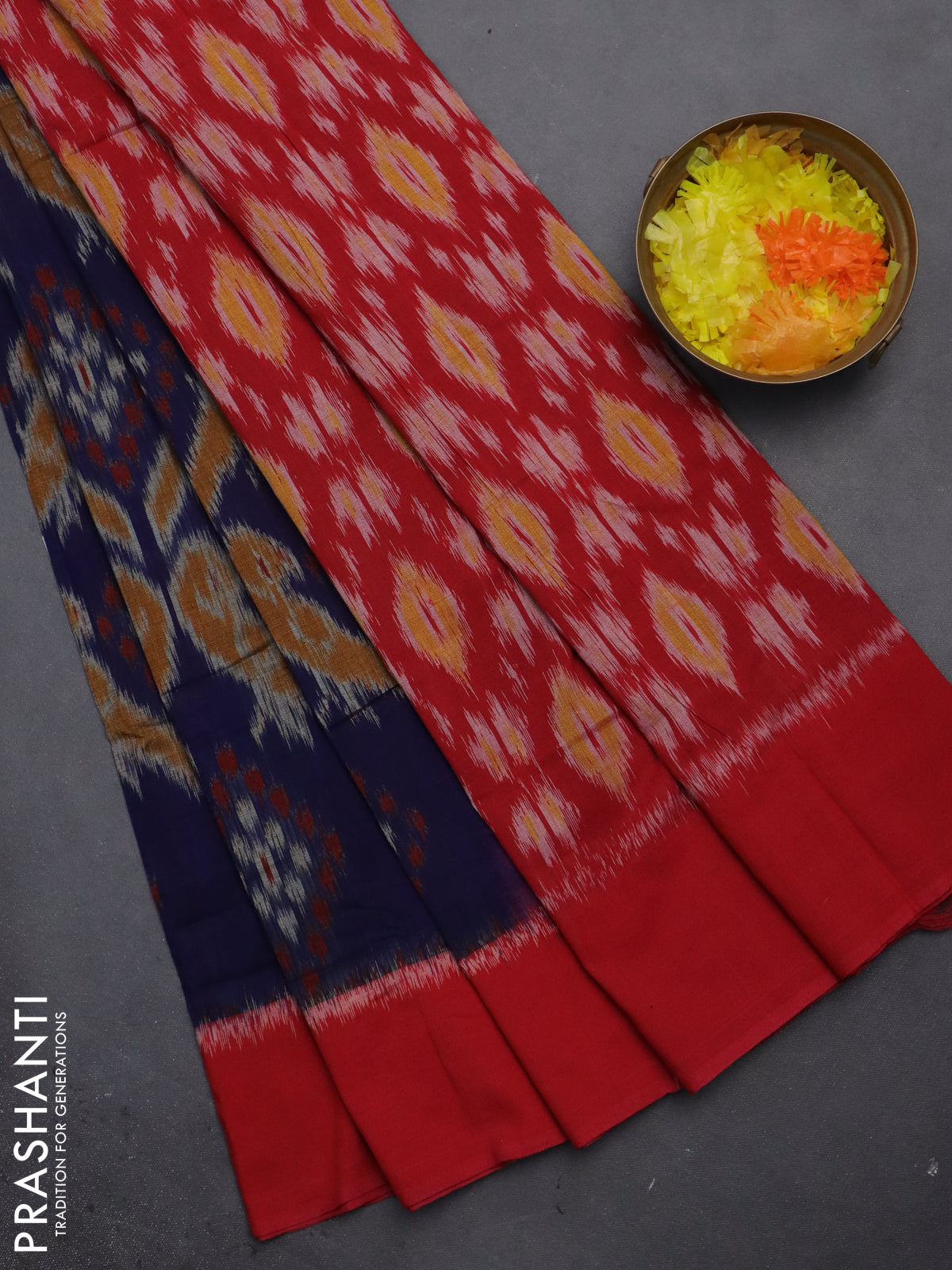 Ikat cotton saree blue and red with allover ikat weaves and simple border