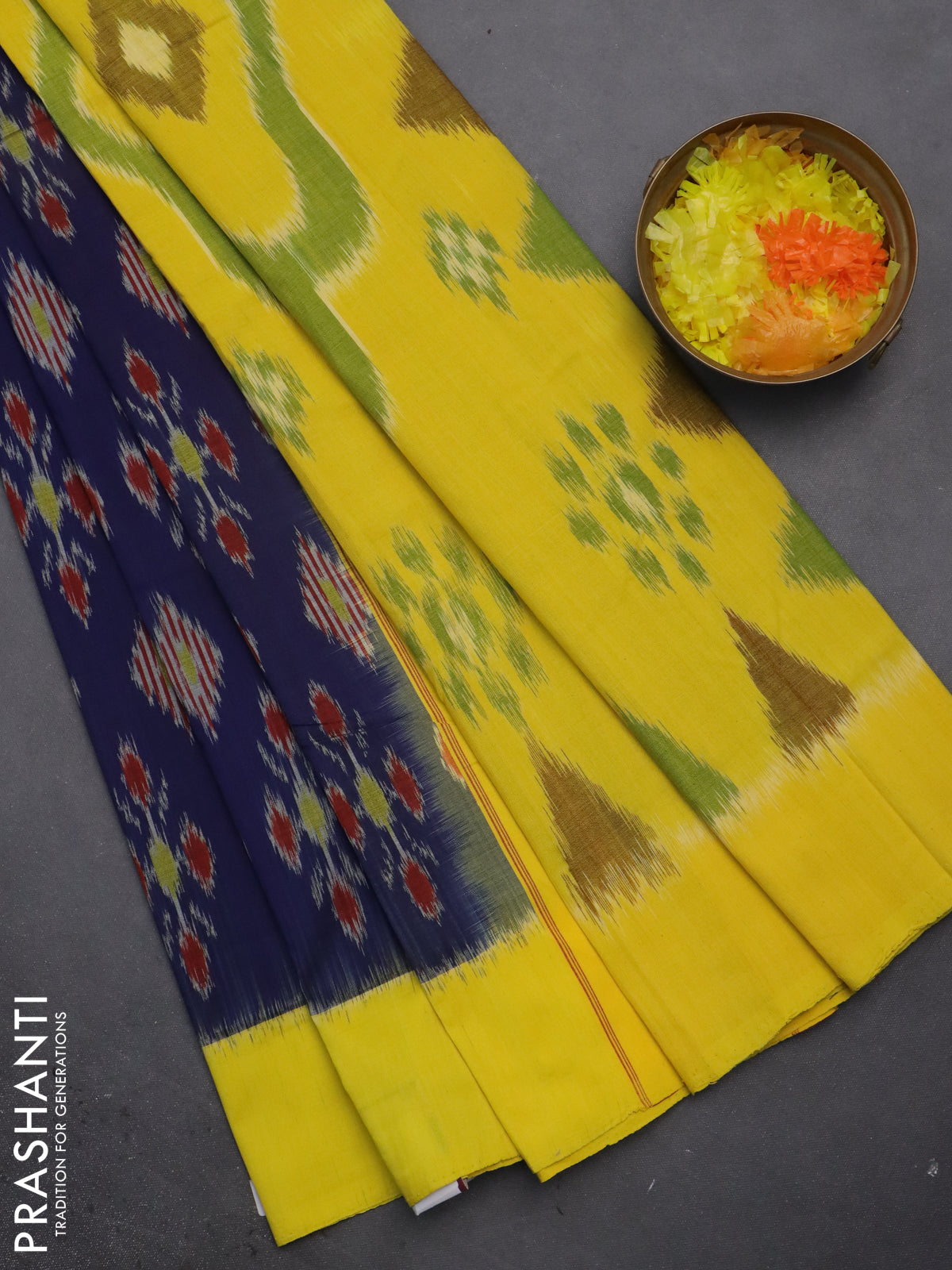 Ikat cotton saree blue and yellow with allover ikat butta weaves and simple border