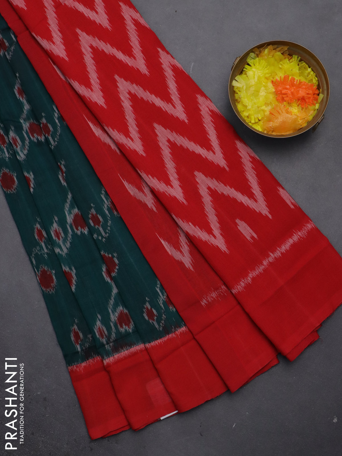 Ikat cotton saree peacock green and red with allover ikat weaves and simple border