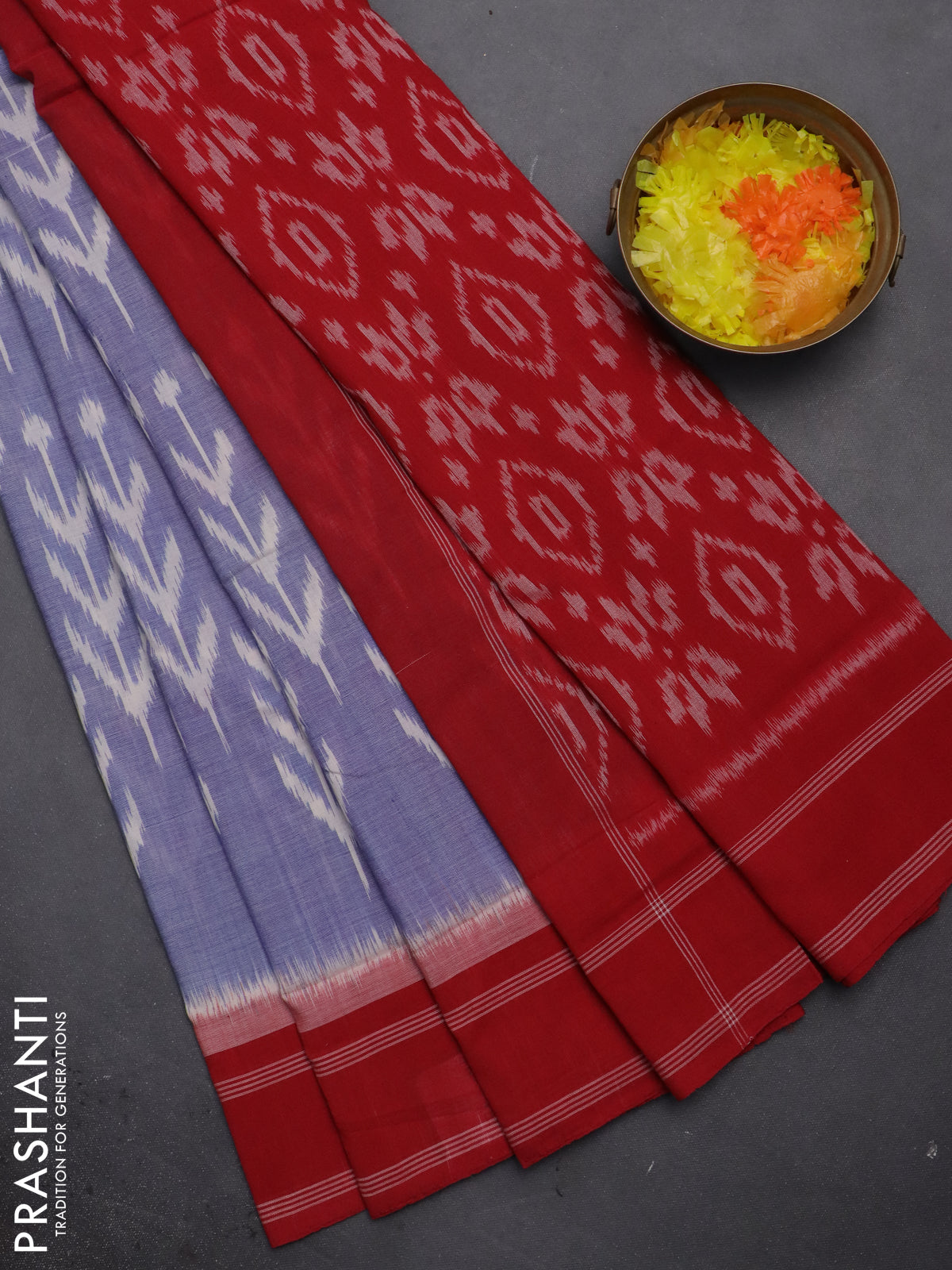 Ikat cotton saree blue shade and red with allover ikat weaves and rettapet border
