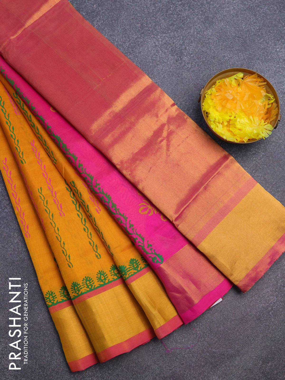 Silk cotton block printed saree mustard yellow and pink with allover prints and zari woven border