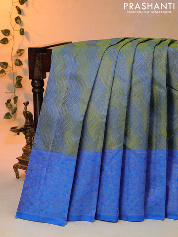 Pure kanjivaram tissue silk saree light green and cs blue with allover silver zari woven brocade weaves and silver zari woven border