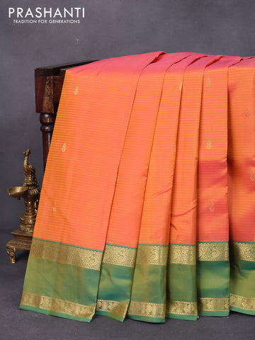 Pure kanjivaram silk saree dual shade of pinkish orange and dual shade of green with zari woven buttas and rettapet annam zari woven border
