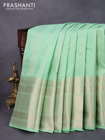 Pure kanjivaram silk saree pastel green with allover zari weaves and long zari woven border