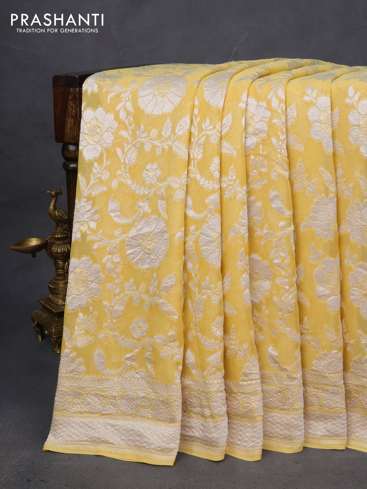 Banarasi georgette saree pale yellow with allover thread & zari woven floral weaves and woven border