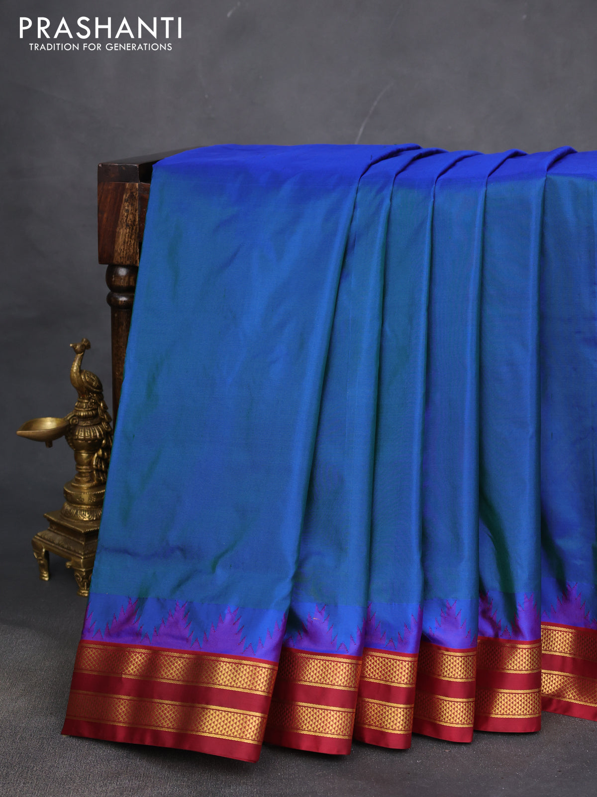 10 yards silk saree dual shade of cs blue and maroon with plain body and temple design zari woven border