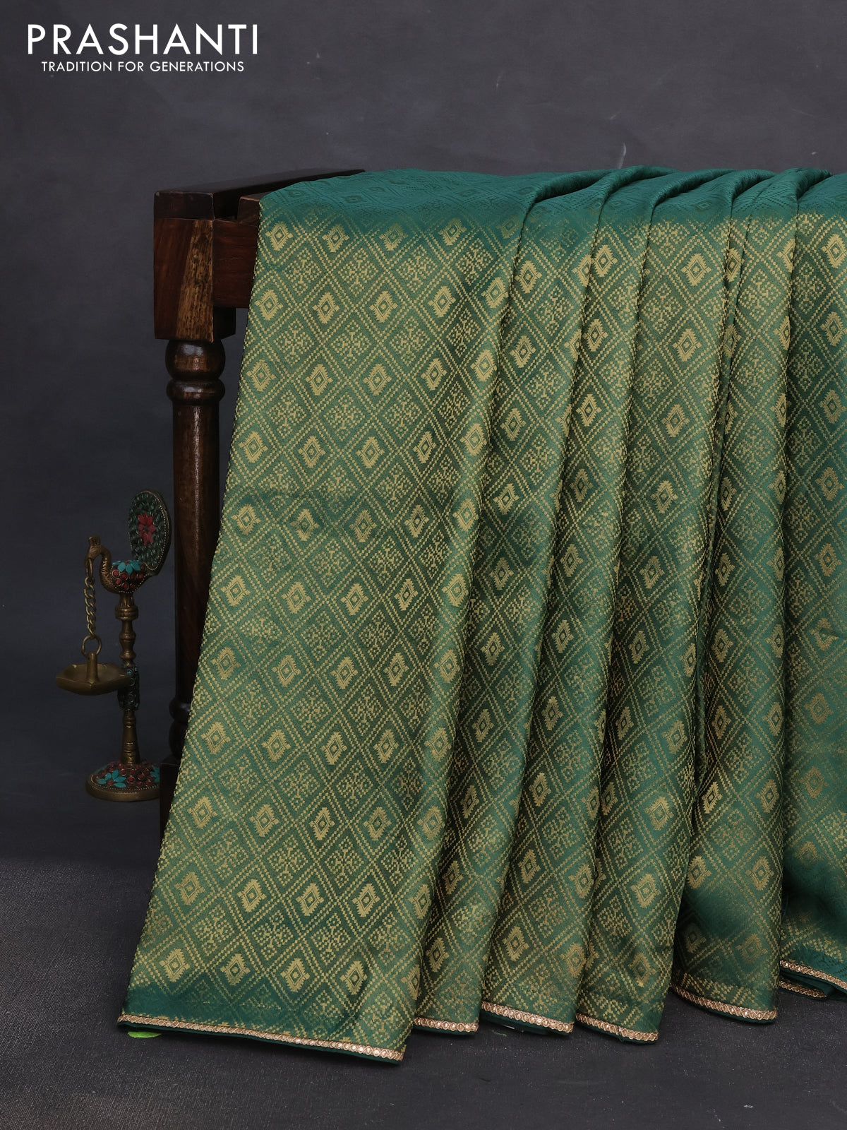 Banarasi semi crepe saree green with allover zari woven brocade weaves and lace work border