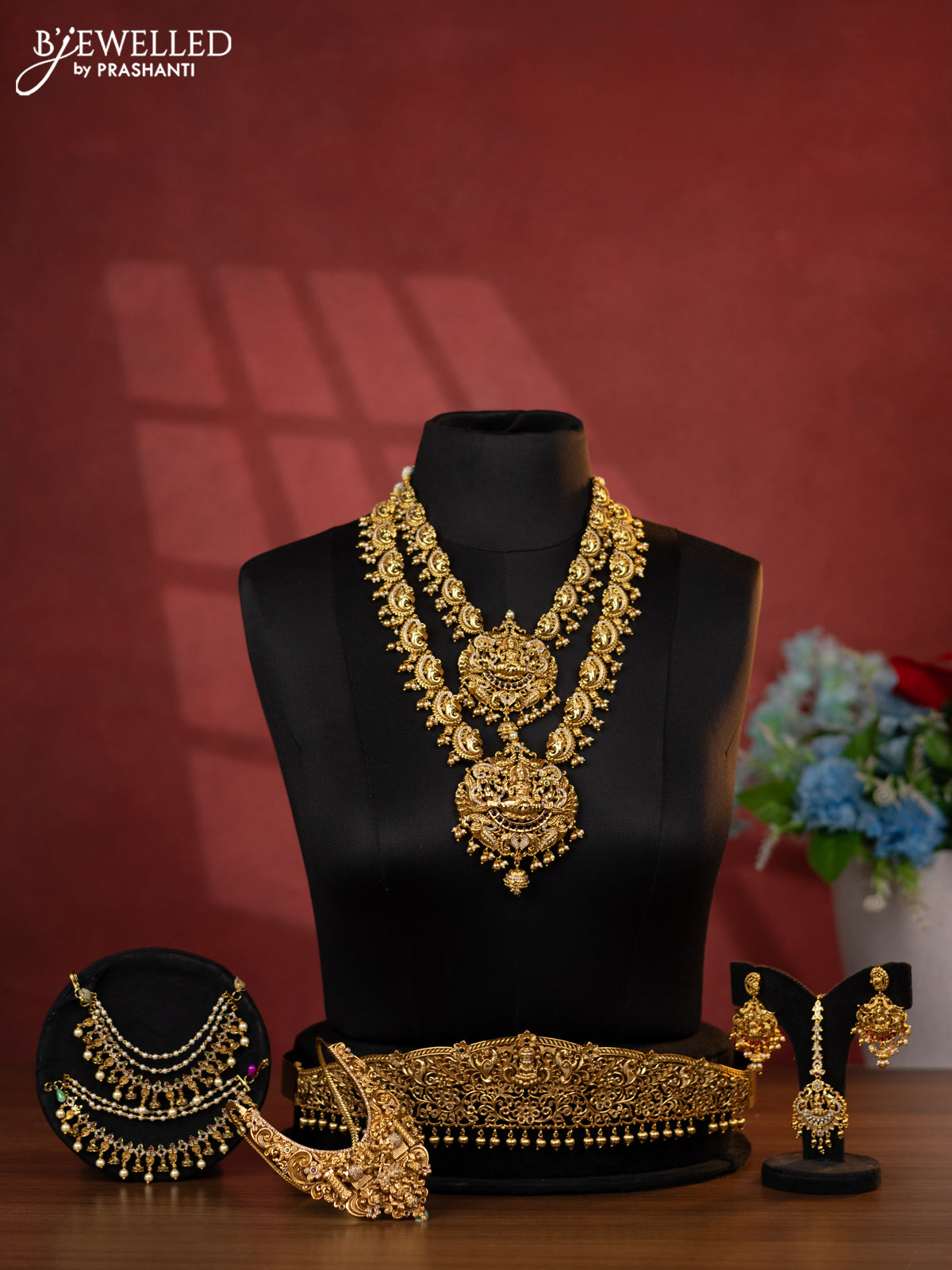 Antique bridal set lakshmi design with kemp cz stones and pearl & golden beads hanging