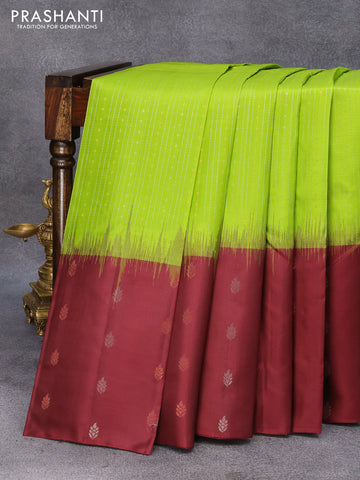 Pure soft silk saree light green and deep maroon with allover silver & copper zari weaves and long silver & copper zari woven butta border