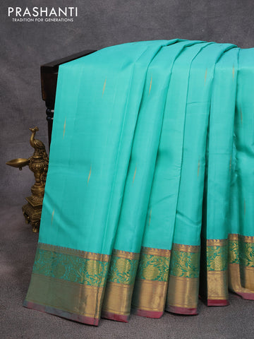 Pure kanjivaram silk saree teal blue and pink with zari woven buttas and floral zari woven border