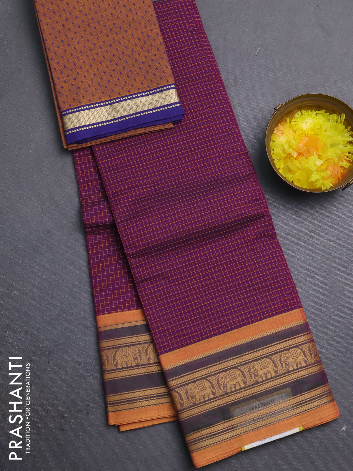 Chettinad cotton saree purple and mustard shade with allover cheked pattern and thread woven border
