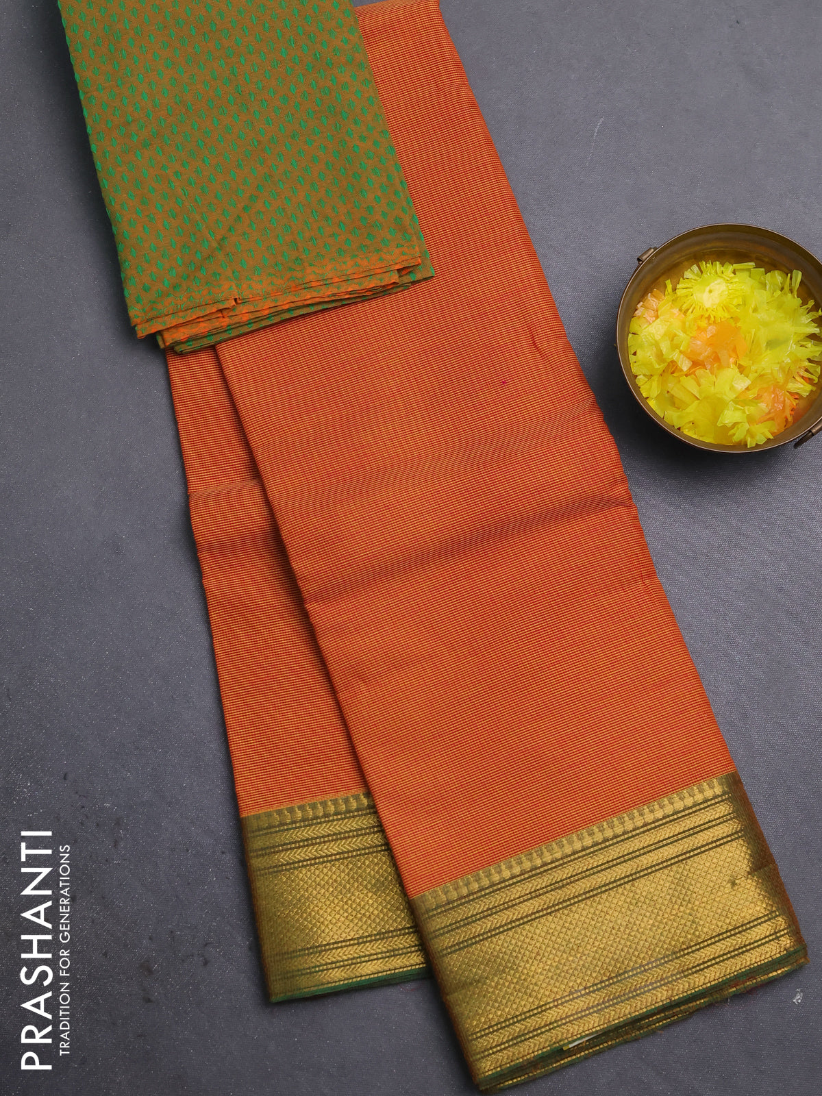 Chettinad cotton saree rustic orange and light green with allover small checked pattern and zari woven border