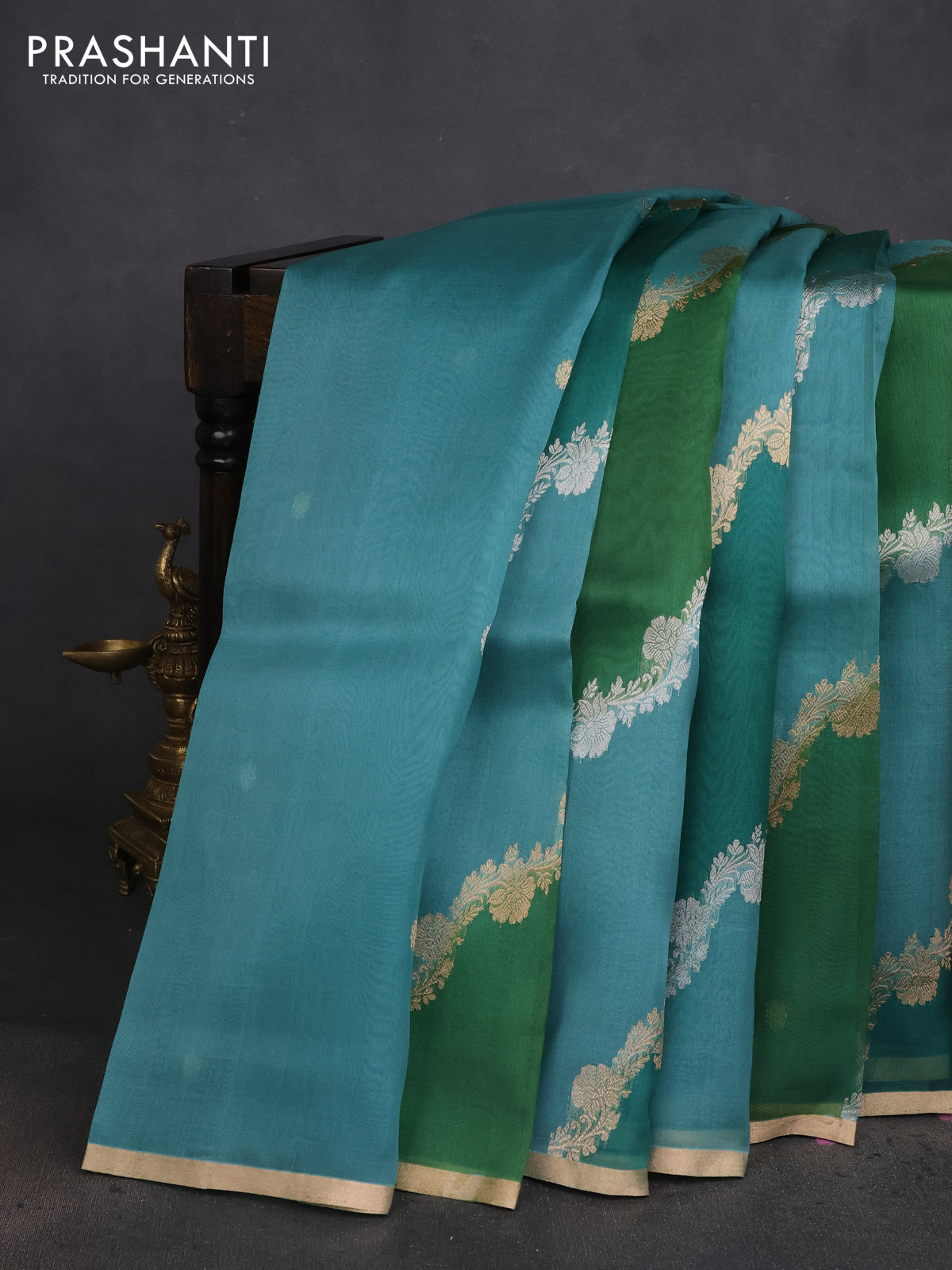 Banarasi organza silk saree teal green with rangakt weaves and zari woven piping boder