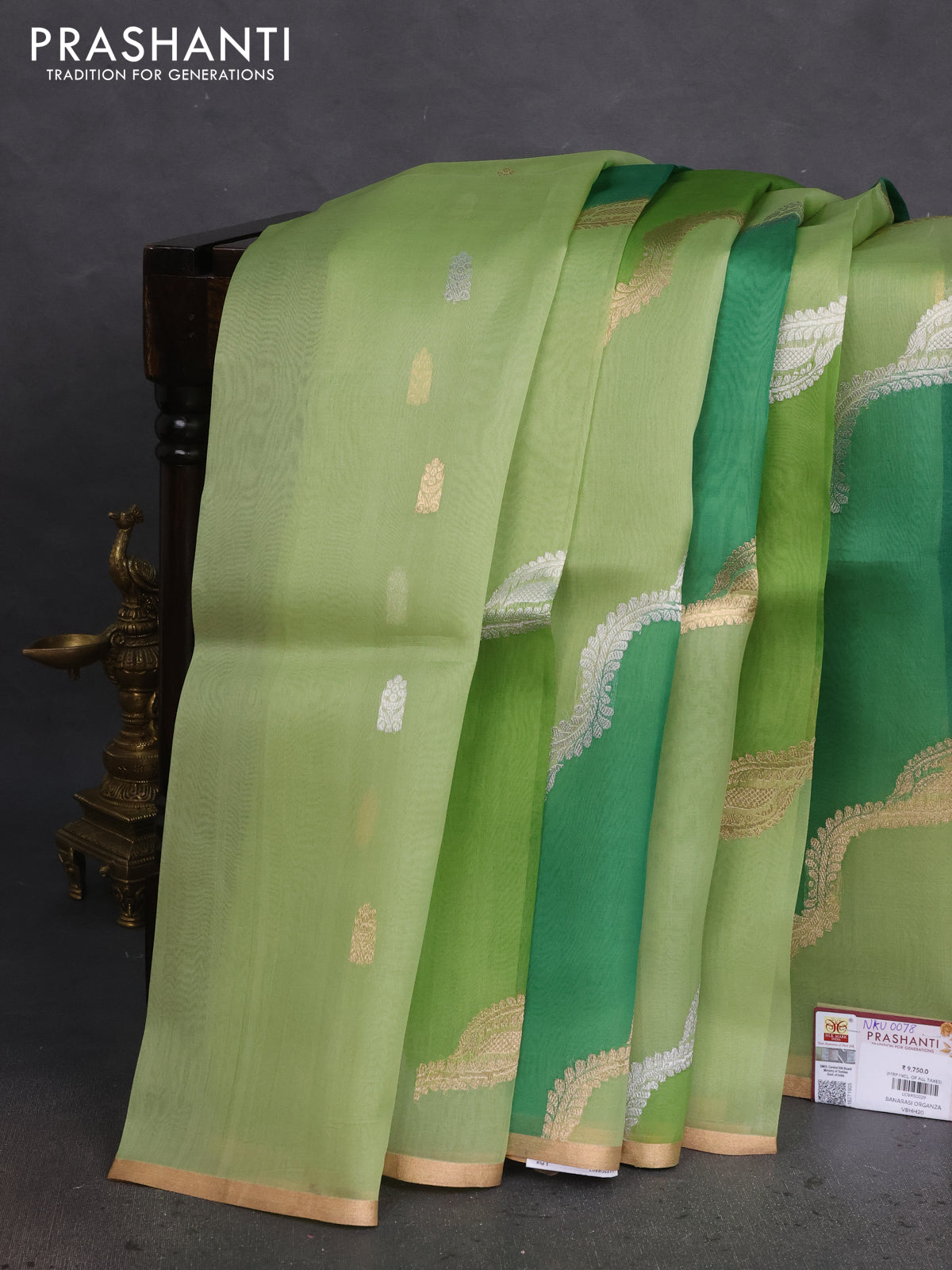 Banarasi organza silk saree green shade with allover silver & gold zari weaves and zari woven piping boder