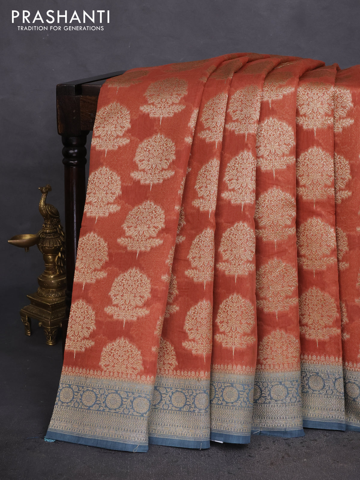 Banarasi silk cotton saree rust shade and pastel blue with allover thread & zari woven butta weaves and woven border