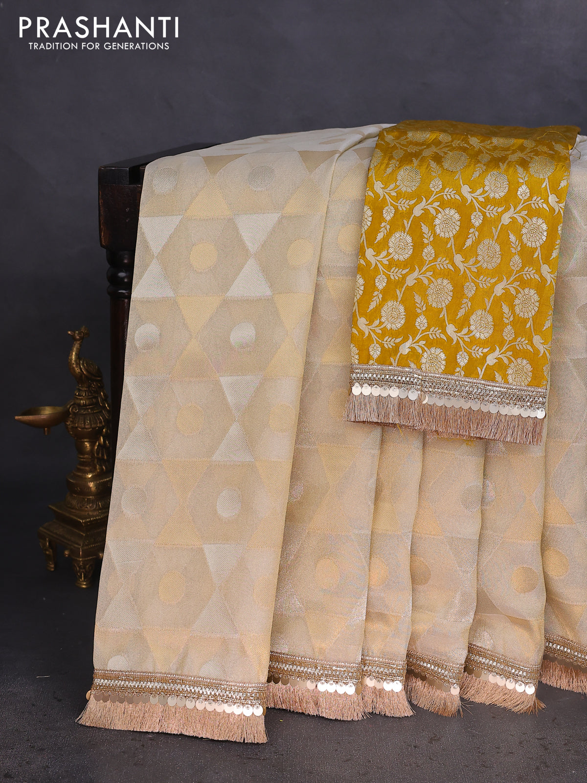 Banarasi tissue saree beige and mustard yellow with allover zari woven geometric wevaes and lace work border